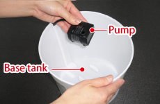 Remove cord with pump from base tank