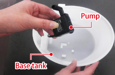 Remove cord with pump from base tank