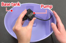 Remove cord with pump from base tank