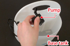 Remove cord with pump from base tank