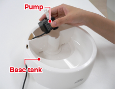 Remove cord with pump from base tank