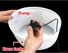 Remove cord with pump from base tank